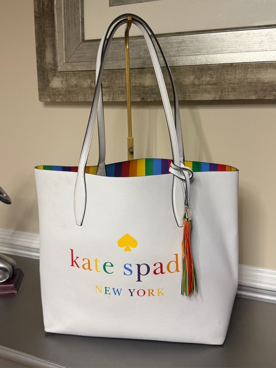 kate spade Handbags - Kate Spade Reversible White Tote with Rainbow Tassel